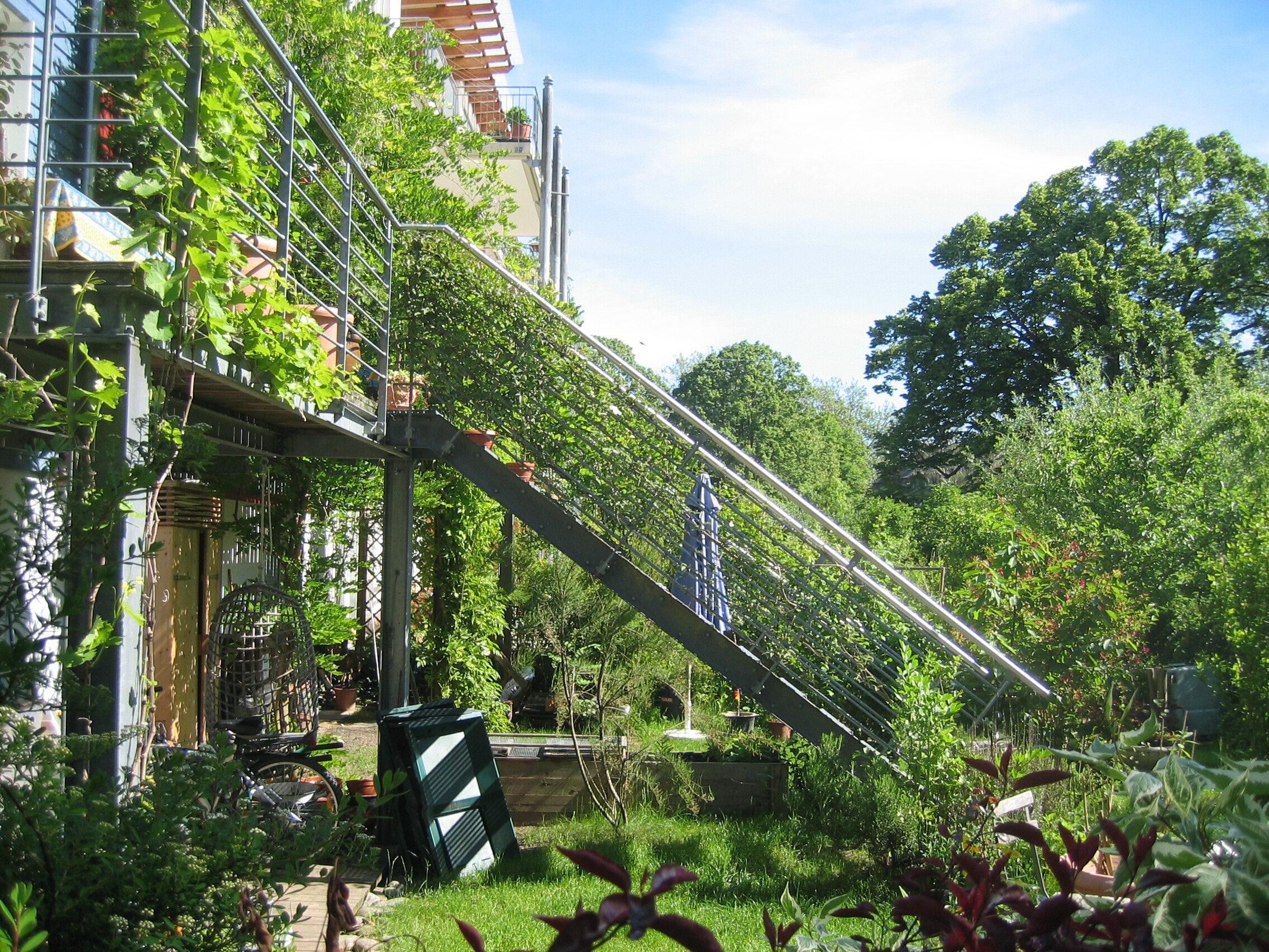 Private terrace facing onto a communal garden