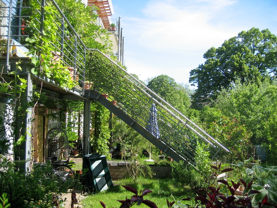 Private terrace facing onto a communal garden