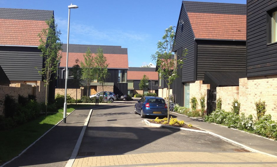 On-street parking within defined landscaped build-outs in Cambridge.