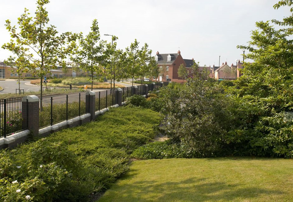 Landscaping at the front of non-residential buildings creates an attractive street scene and provides external amenity space for users.