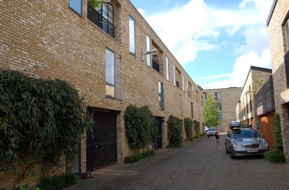 While parking is available in Accordia, Cambridge public space is geared towards pedestrians and cyclists with room for flexibilty over time.