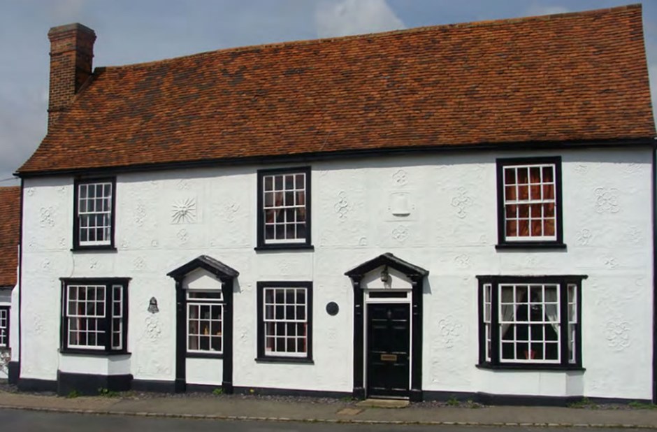 The Bell in Great Easton, a former public house dating back to the 15th century, comprises of a timber framed building with pargetted facades.
